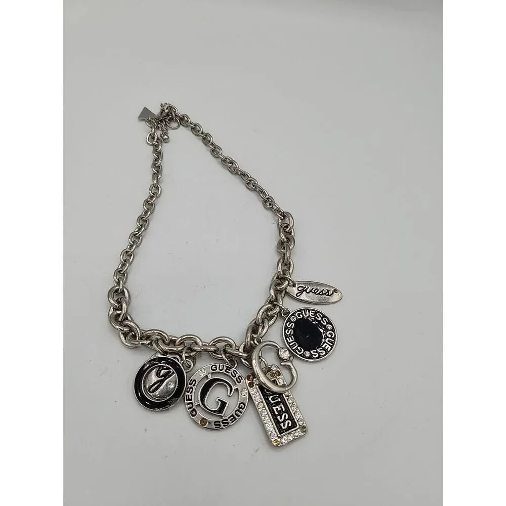 GUESS 14āāSilver Tone Choker Necklace with 7 Charms